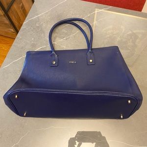 Furla Italian bag in blue. Handles are long enough to sit on your shoulder.